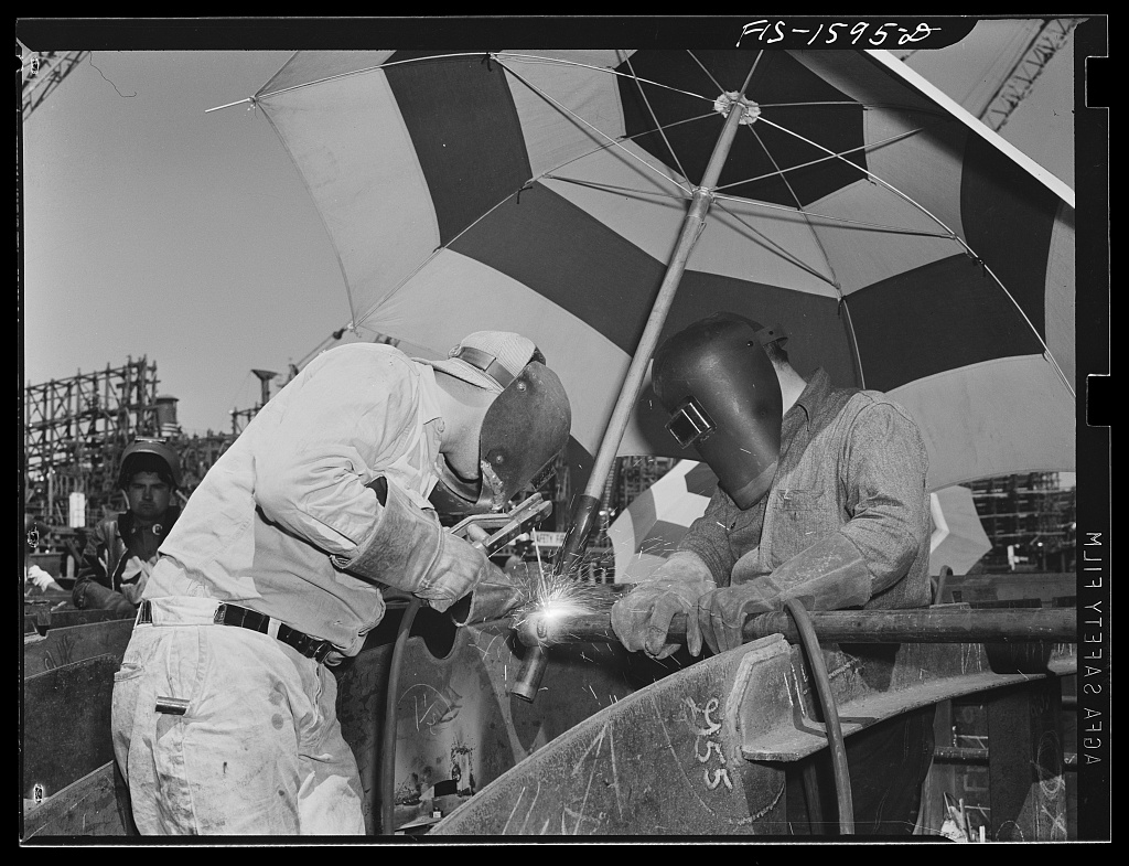 Welders at work at the California Shipbuilding Corporation, Wilmington, California, 1942