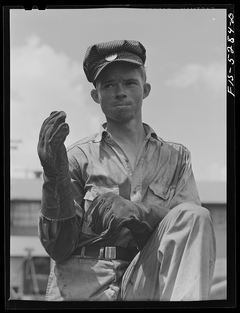 A welder's helper at Ingalls Shipbuilding, Decatur, Alabama, 1942